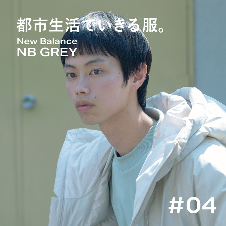 ニューバランス NB GREYのダウンショートジャケットを着た男性モデル