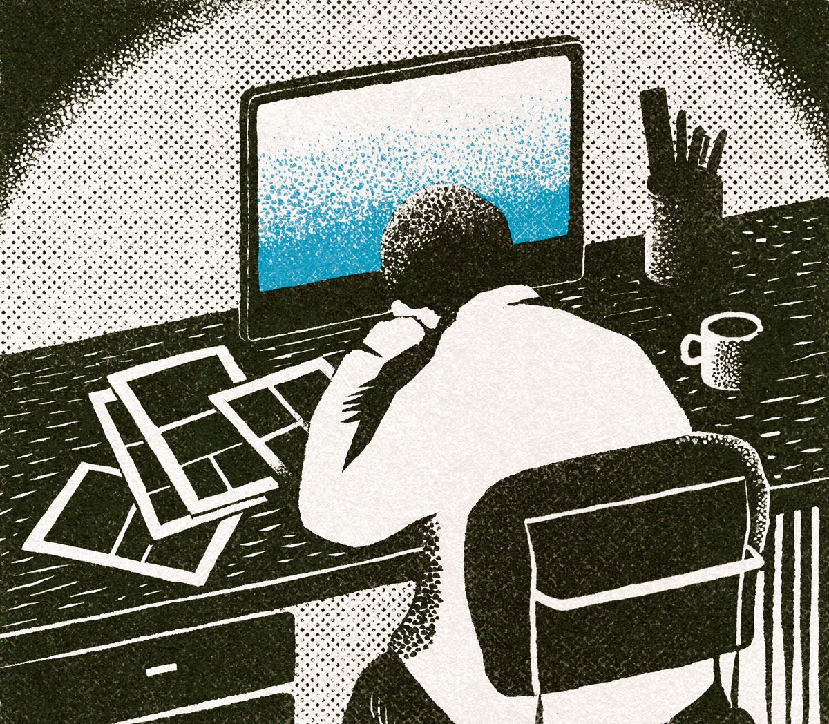 PCと向きあう男性